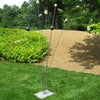 Cattail Sculpture made of Beach Stones, Stainless Steel, and Granite outdoors