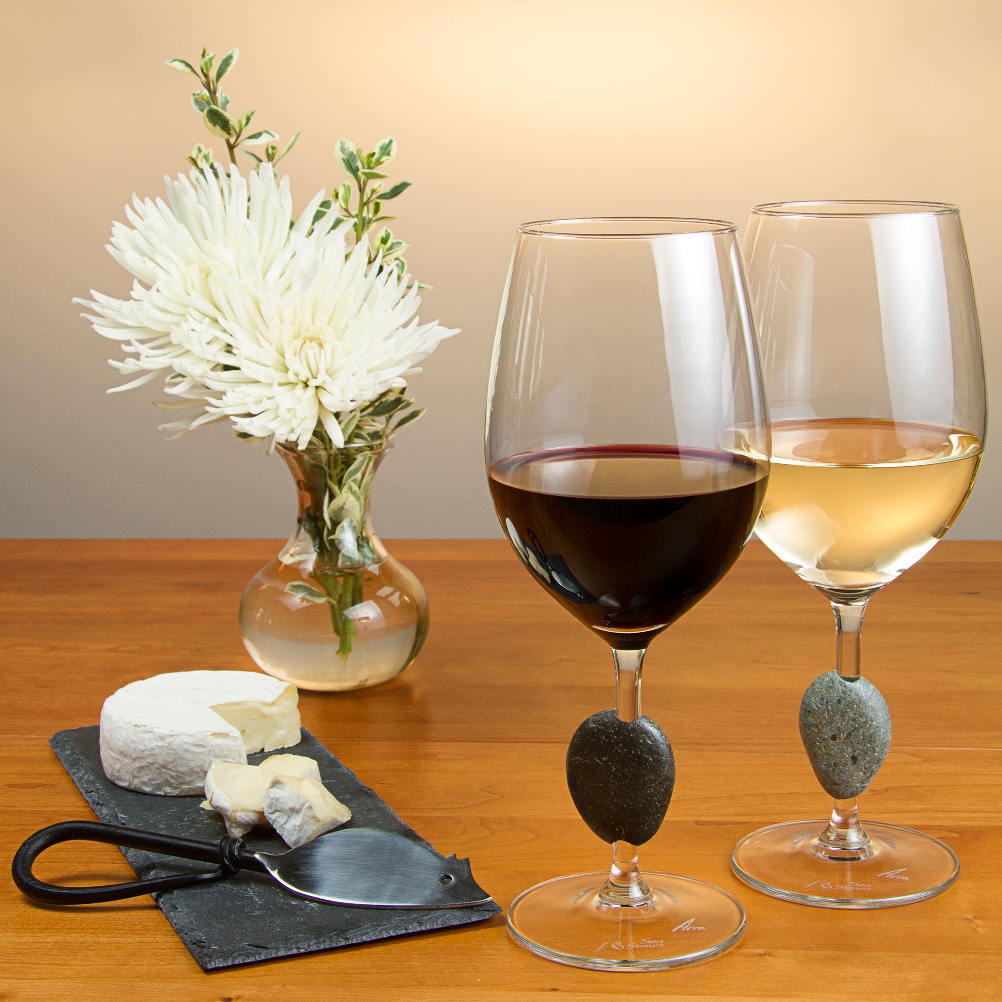 https://sea-stones.com/cdn/shop/products/Touchstone_Stone_Wine_Glass_with_Cheese_2048x2048_c550be05-1e39-4a73-8ef4-57d5331130be.jpg?v=1560523986